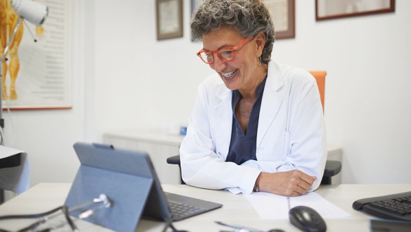 doctor in the office using ipad