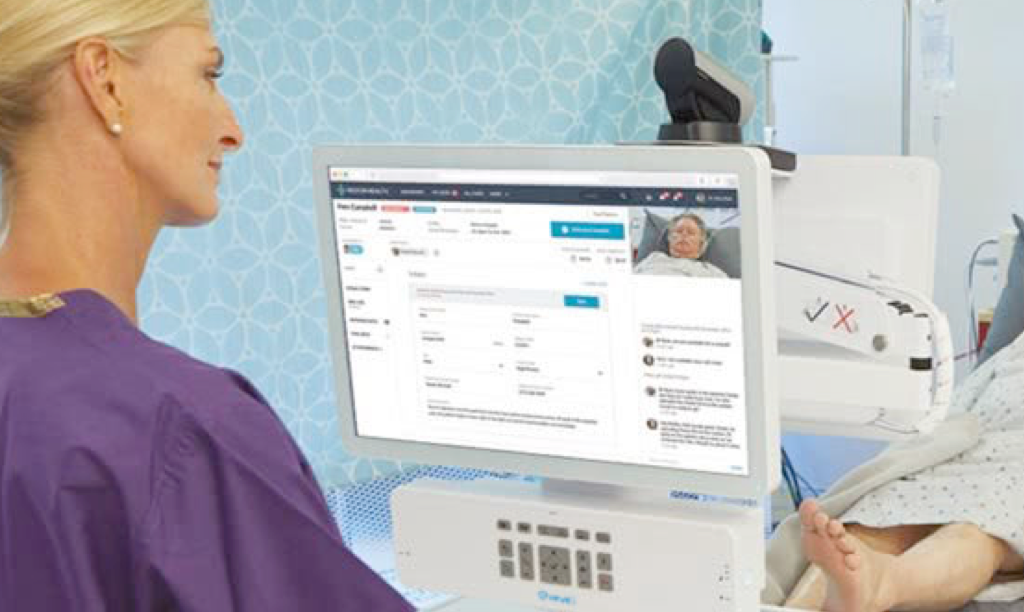 nurse in the hospital looking at the patient data