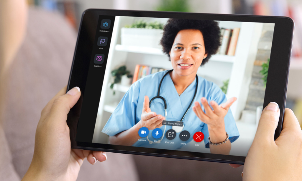 person holding ipad talking to a provider