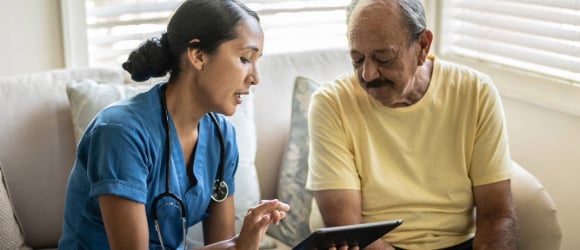 Nurse and patient talking