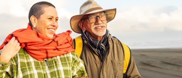 people walking on the beach