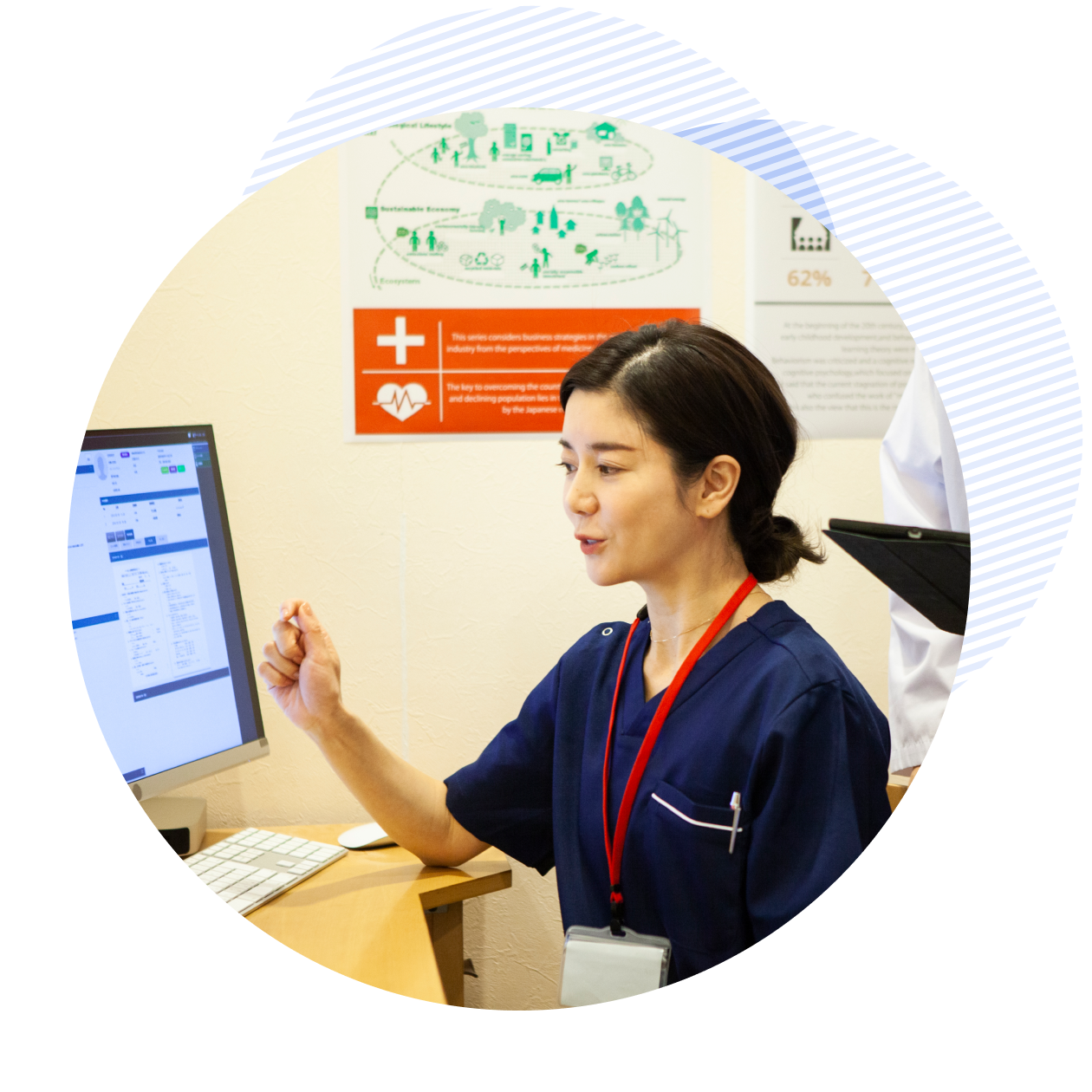 clinicans looking at the computer screen and collaborating