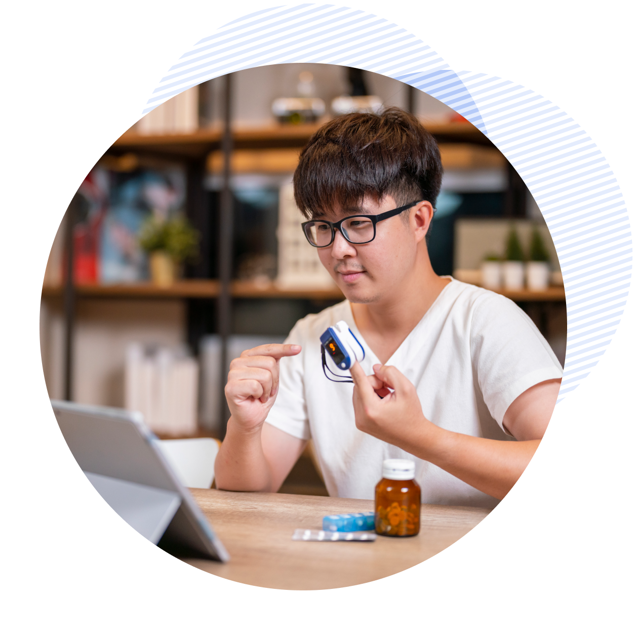 Man in bed looking at screen of laptop and consulting with a doctor online at home, telehealth