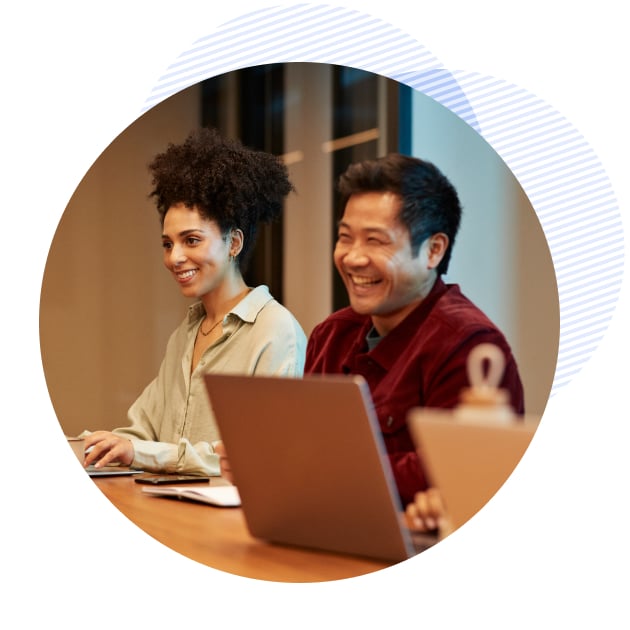 a man smiling at the meeting
