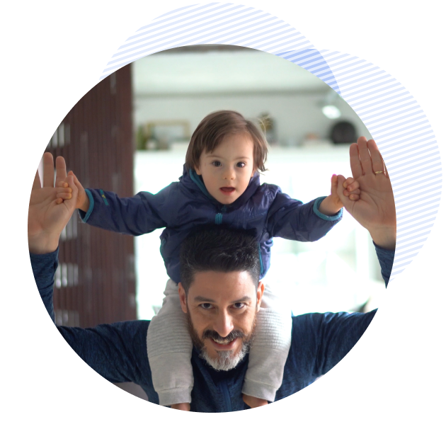 happy man carring his son on his shoulders