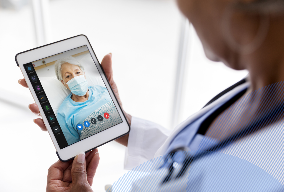 provier talking remotely to a patient via amwell platform