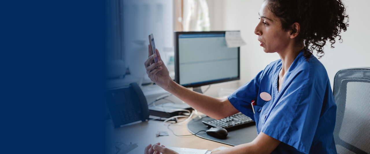 private practice, provider looking at her phone