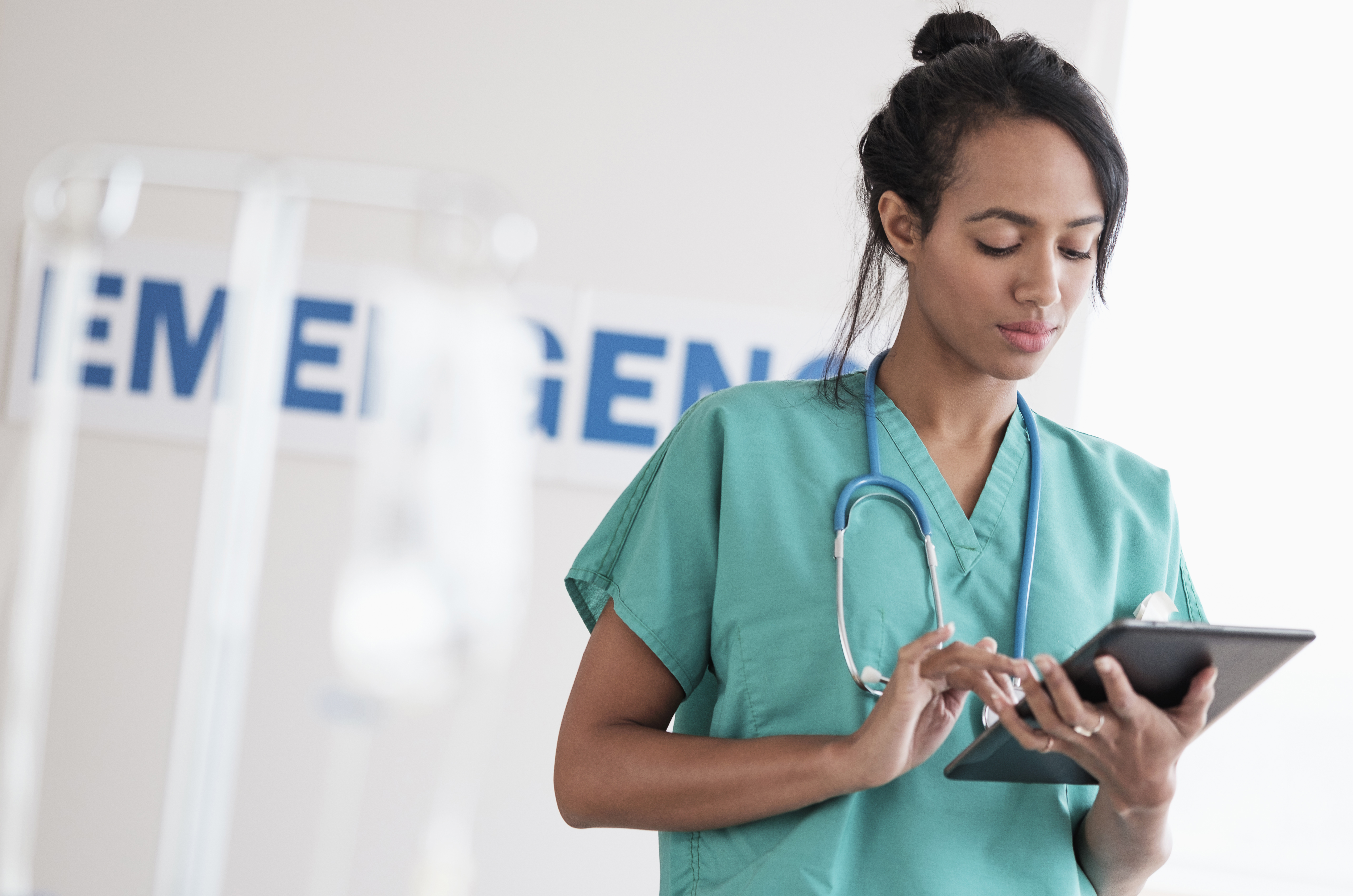 provider looking at her tablet